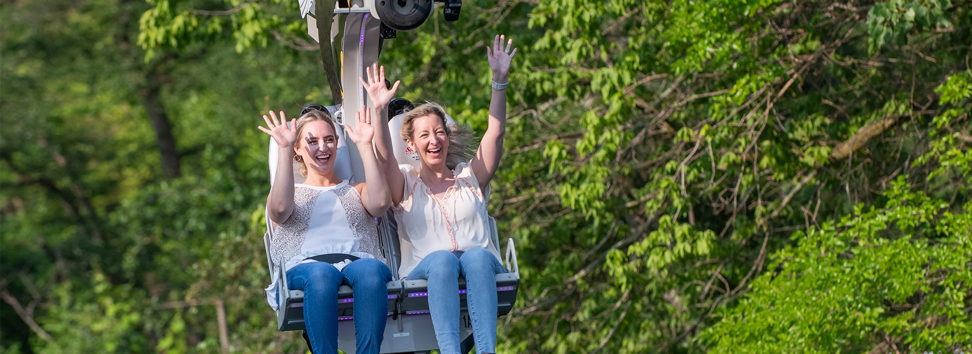 guests enjoying zipline at the Zoo
