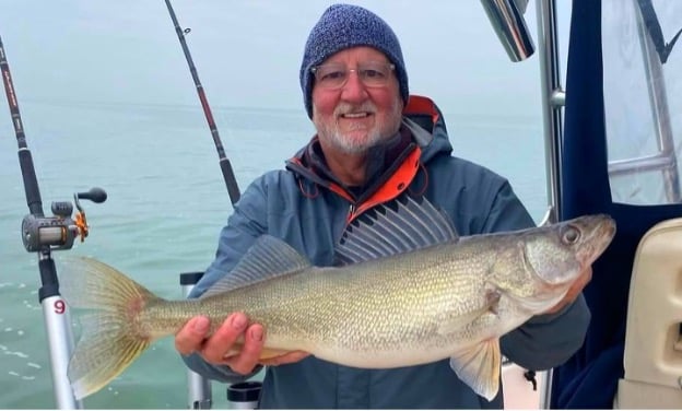 Man holding Lake Erie walleye