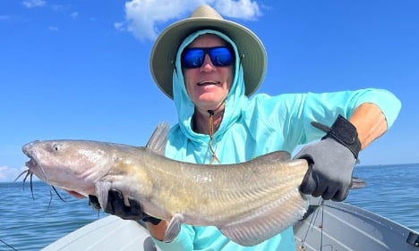 Man holding large fish