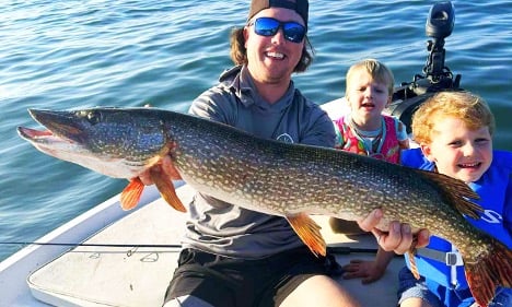 Man holding a large walleye
