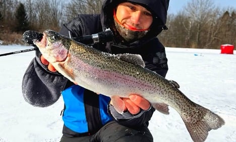 Man holding a rainbow trout