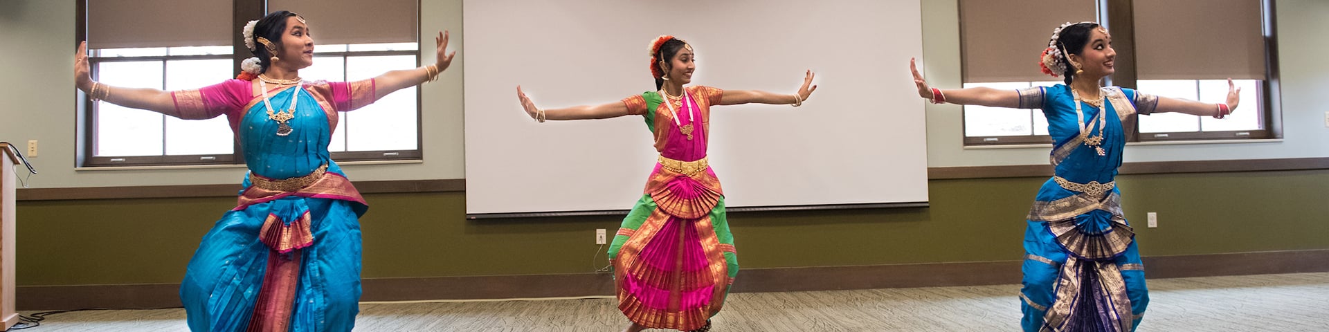 Women dancing in cultural clothes
