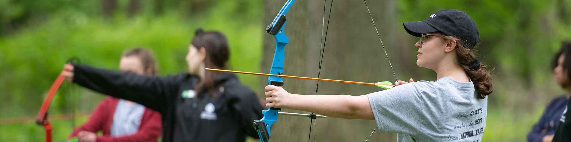 People doing archery
