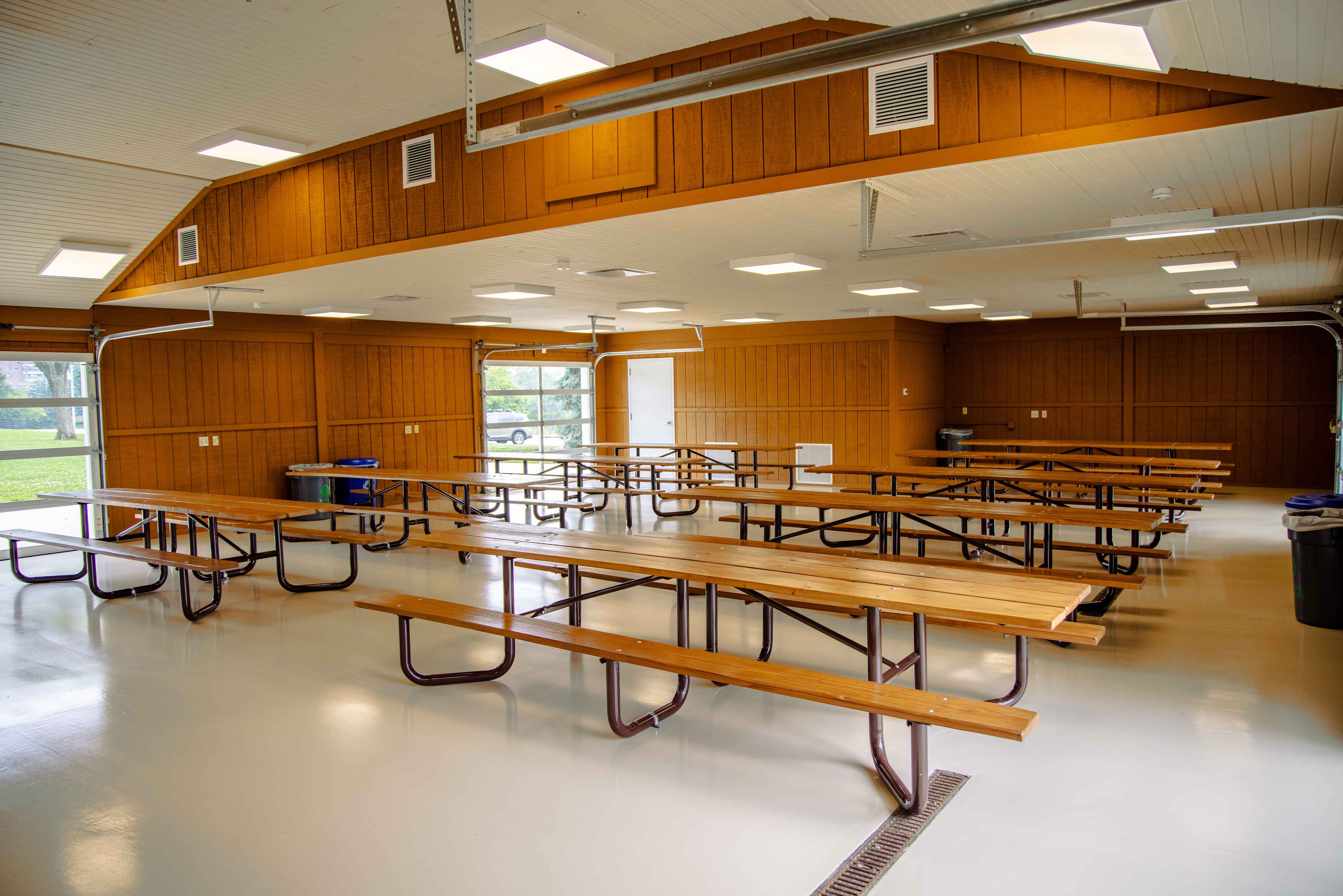Picnic tables inside a building