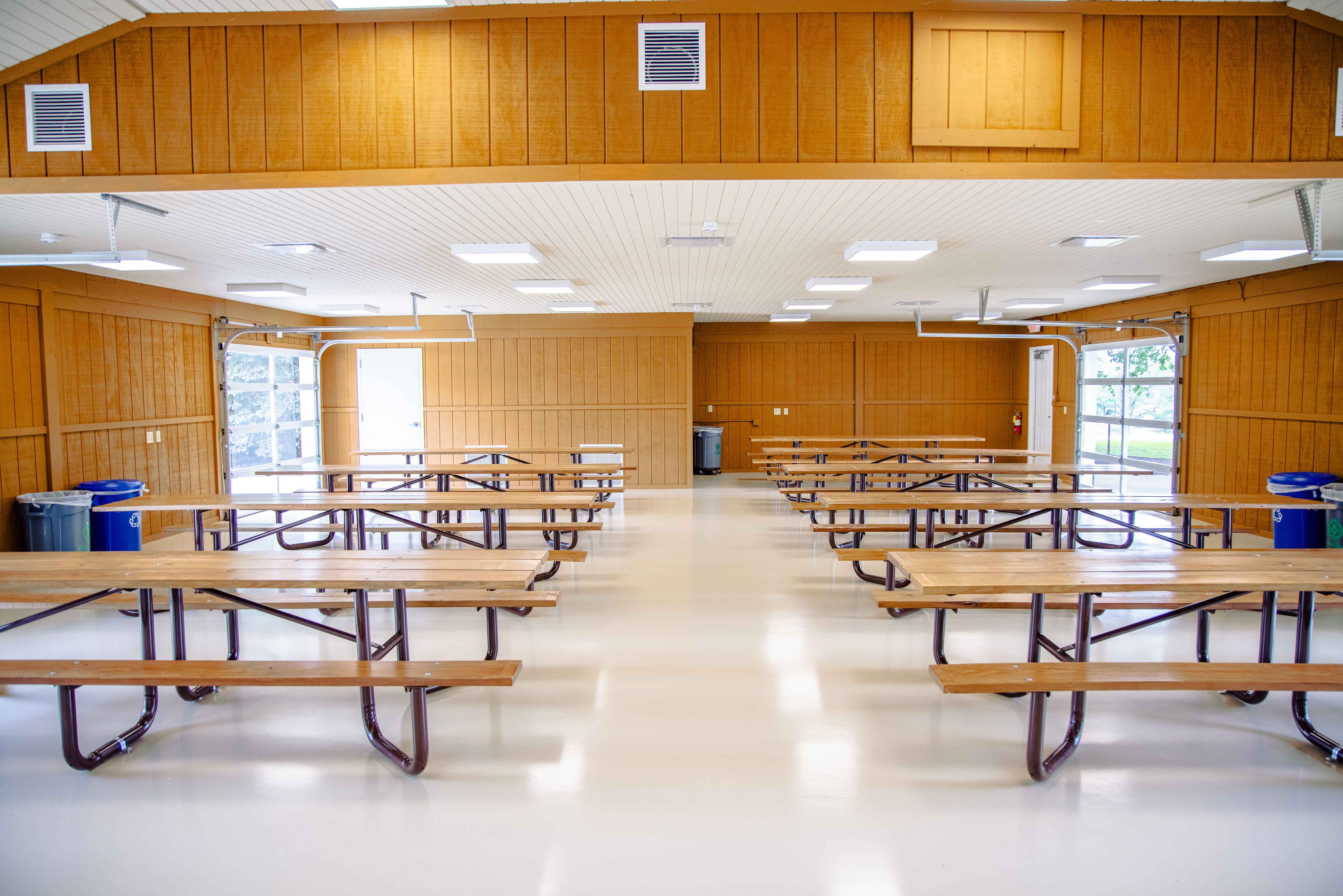 Picnic tables inside a building