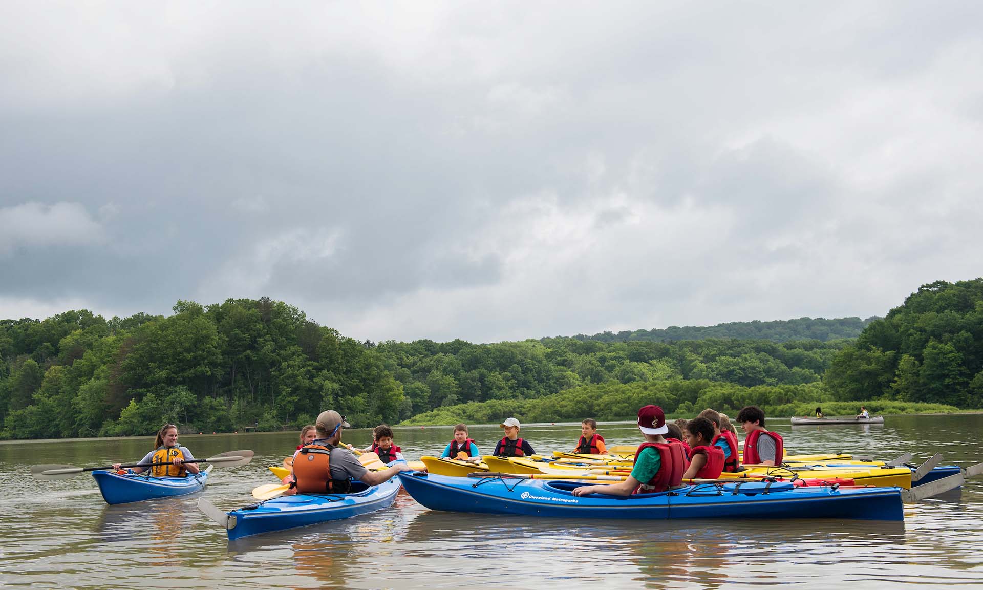People kayaking on water