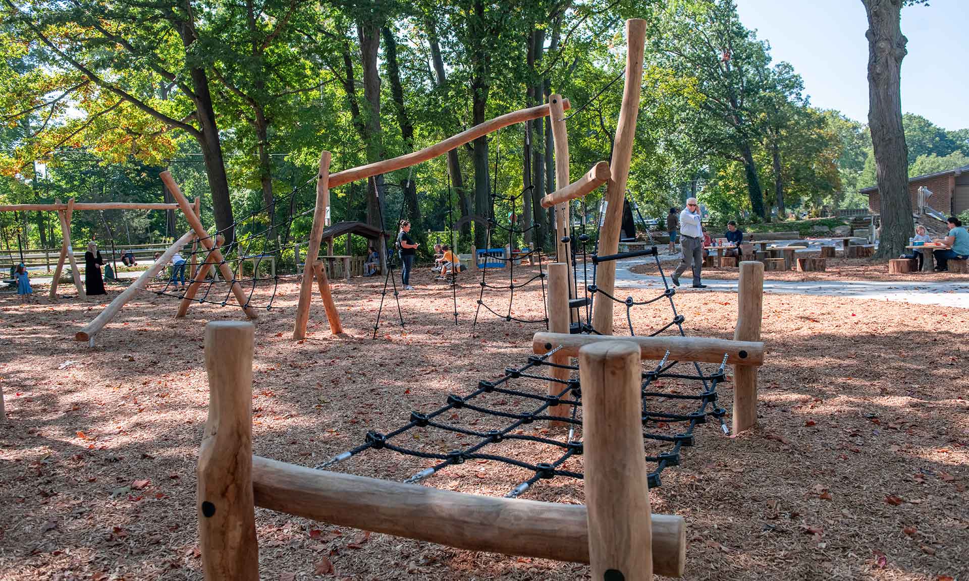 Playground with wood and rope bridge