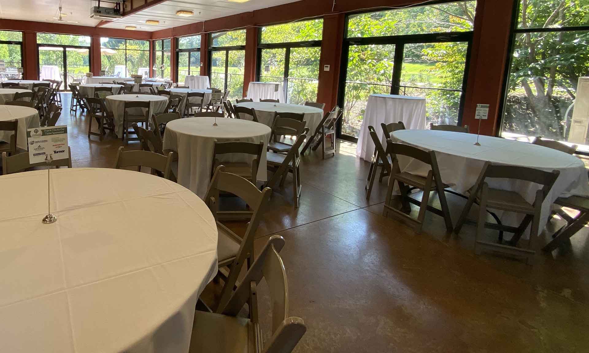 Event space with tables with white cloths
