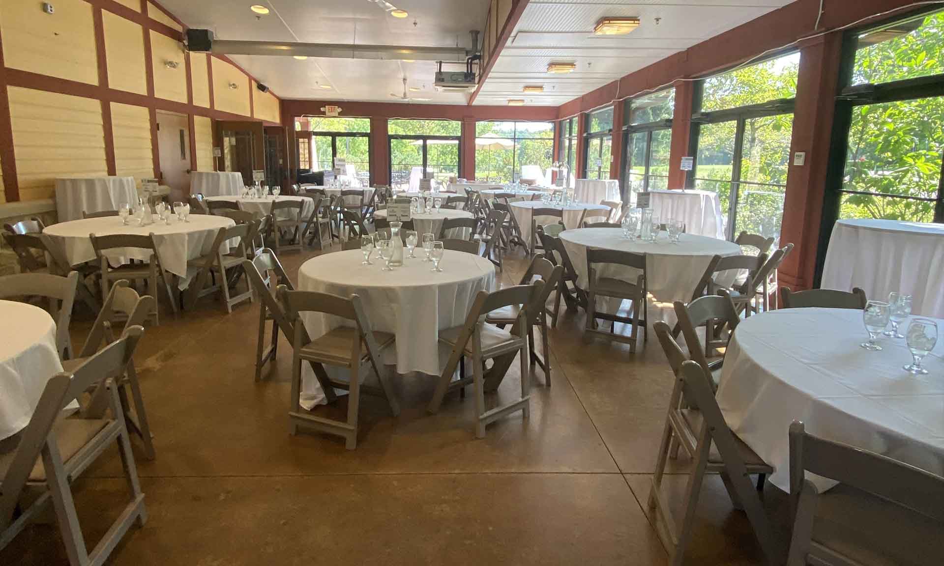 Event space with tables with white cloths
