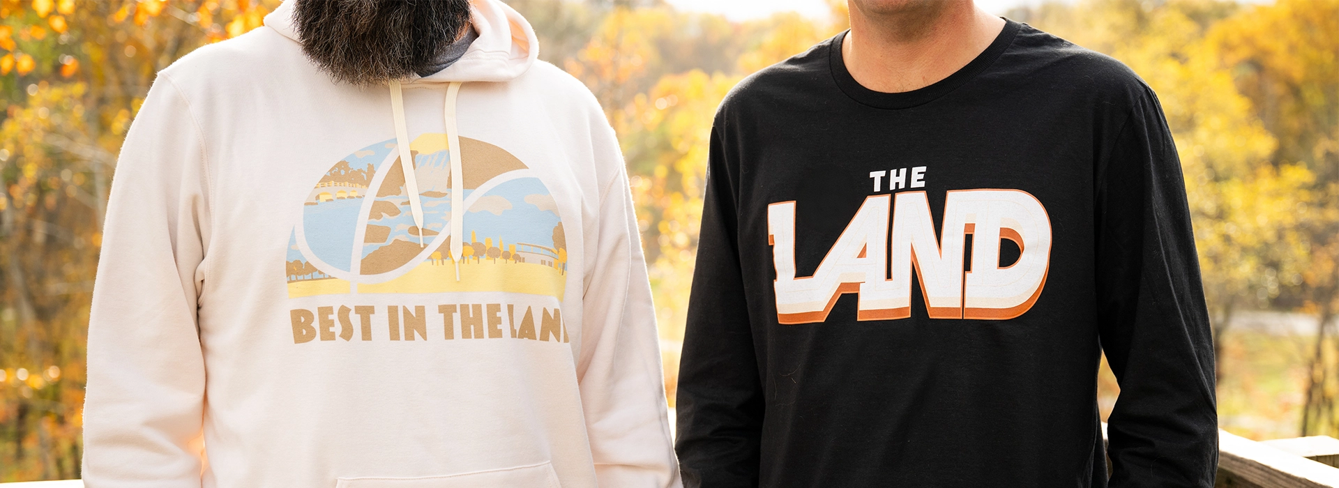 Photo of Best in the Land sweatshirt and black the land one sleeve shirt