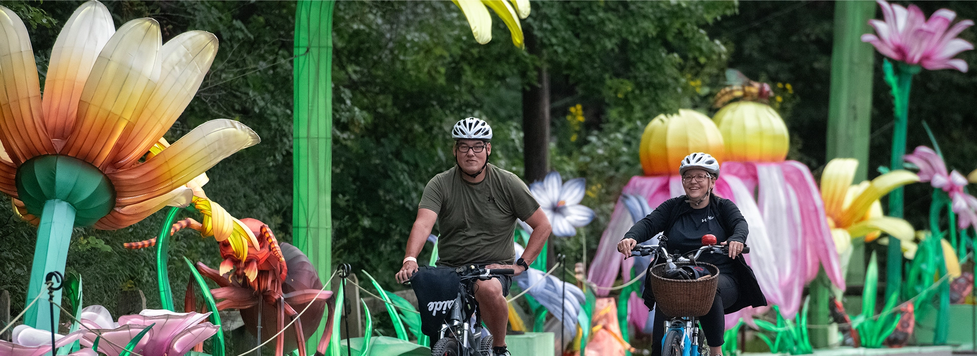 Photo of couple riding bikes at Asian Lantern Festival
