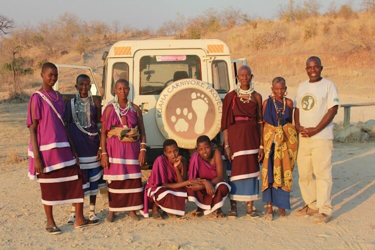 Ruaha-Carnivore-Project-Member-in-Front-of-Truck.JPG