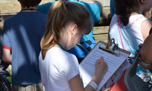 Girl-Writing-on-Clipboard.jpg