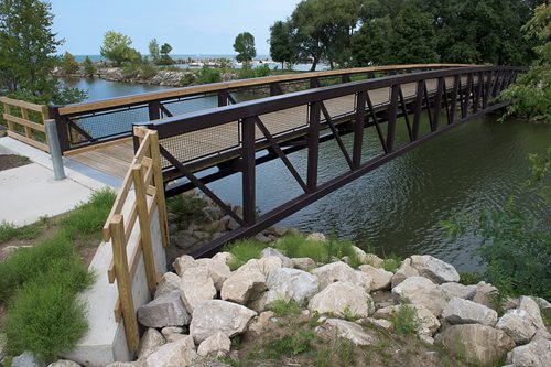 there is a bridge that is over a body of water, a digital rendering inspired by Ernest Heber Thompson, instagram contest winner, environmental art, bridge over the water, wooden bridge, wood bridges