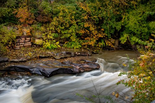 arafed view of a river with a rock in the middle, a photorealistic painting by Dennis Ashbaugh, featured on flickr, hudson river school, a river flowing with waterfall, outdoor fine art photography, hdr photography